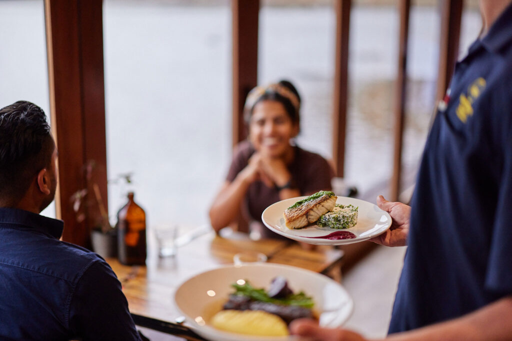 Young couple dine on quality dishes at Lakeside Restaurant